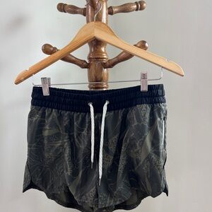 Vuori Green and Black Athletic Shorts with Relaxed Fit